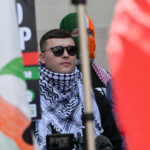 Kneecap rapper in UK court on “terrorism” charge over flag