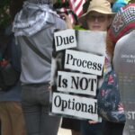 Protesters rally as Kilmar Abrego Garcia pleads not guilty to human smuggling charges