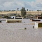 Rescuers in South Africa search for the missing after floods as the de...