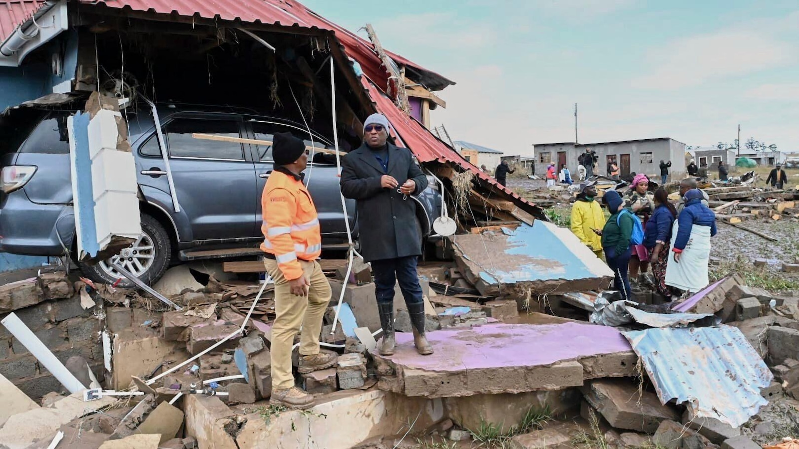 Rescuers in South Africa search for the missing after floods as the death toll rises to 57