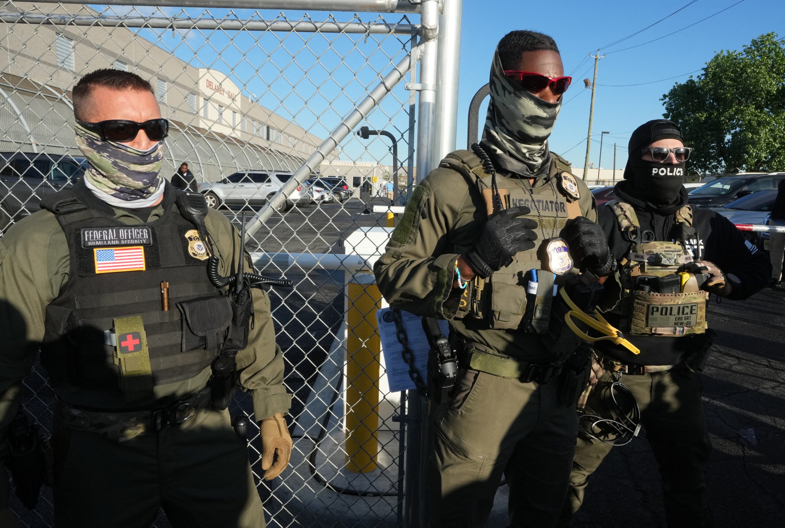 ICE agents guard Delaney Hall, a newly-converted immigrant detention centre in Elizabeth, New Jersey